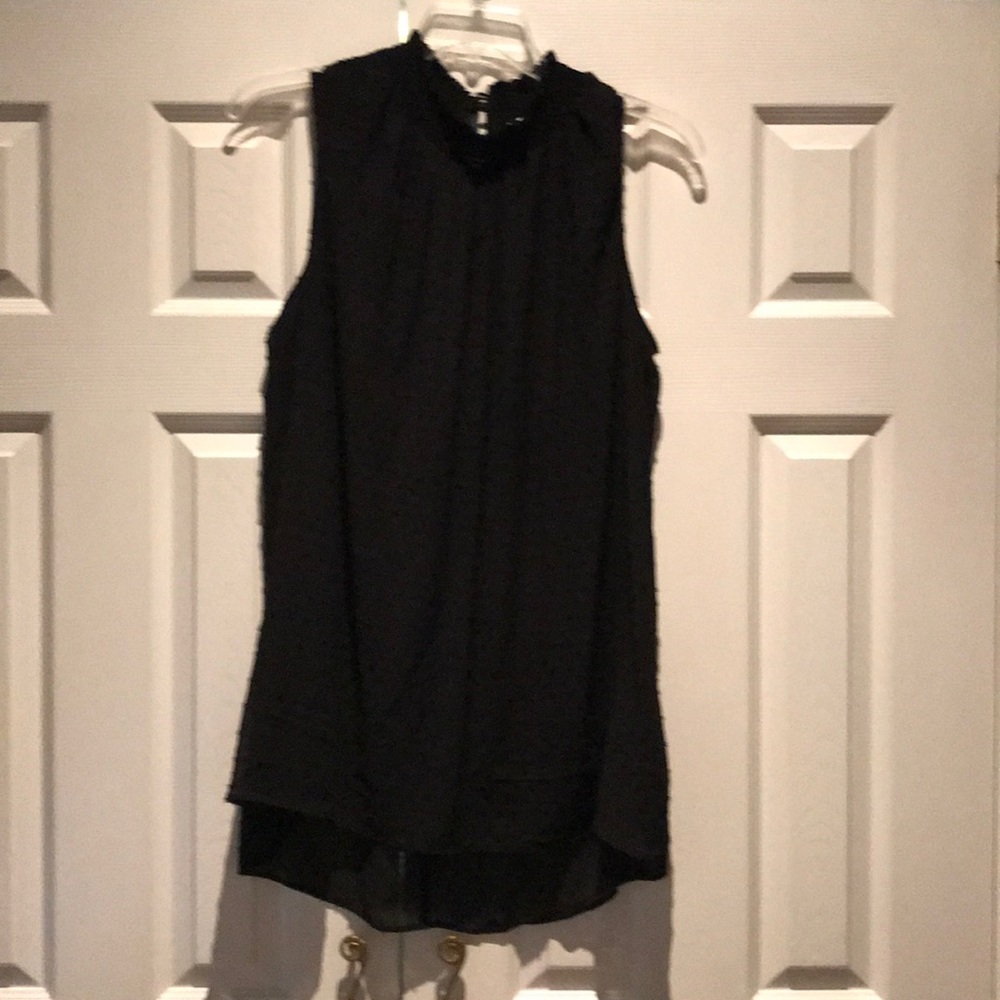 Sleeveless mock neck shirt
